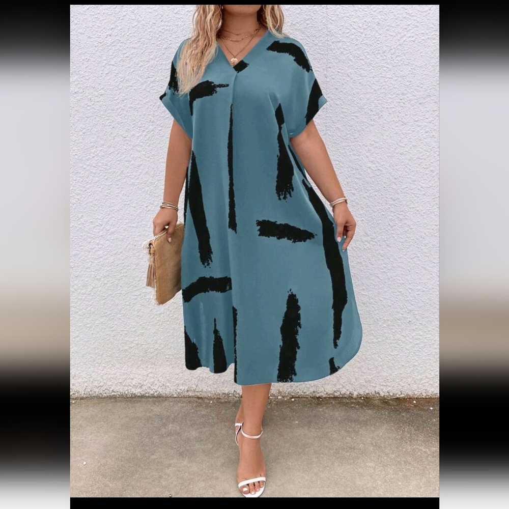 Lovely ladies blue and black dress , very roomy and light weight,  comfortable